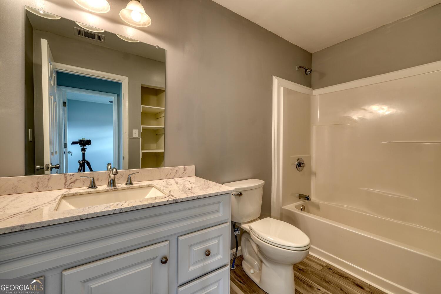 16 Antioch Church Road Blairsville, GA 30512 - Photo 25 of 36 a bathroom with a sink a toilet and shower