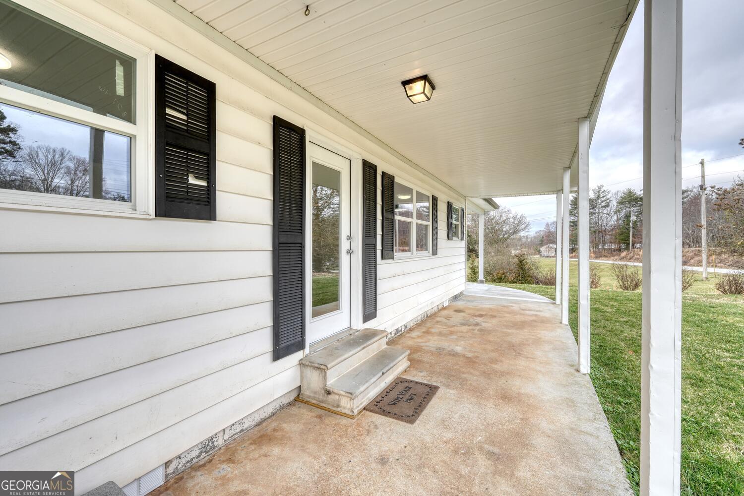 16 Antioch Church Road Blairsville, GA 30512 - Photo 7 of 36 a view of a porch