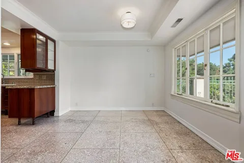 a bed room with a bed and a couch