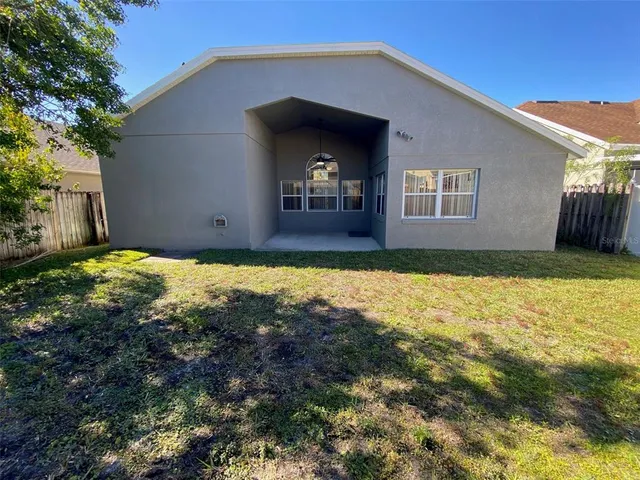 a view of a yard with an umbrella
