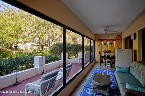 a outdoor living space with furniture and garden view