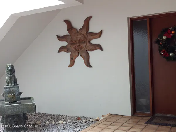 a kitchen with stainless steel appliances a stove a microwave and sink