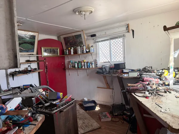 a view of a workspace with furniture