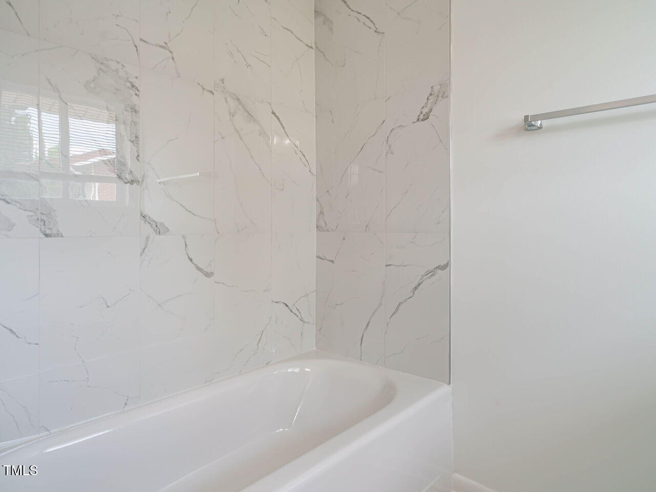 2316 Champion Court Raleigh, NC 27606 - Photo 24 of 27 a close view of a bathtub in bathroom