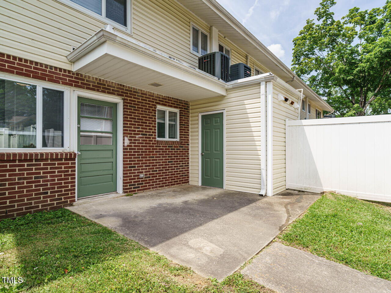 2316 Champion Court Raleigh, NC 27606 - Photo 26 of 27 a front view of a house with a garage