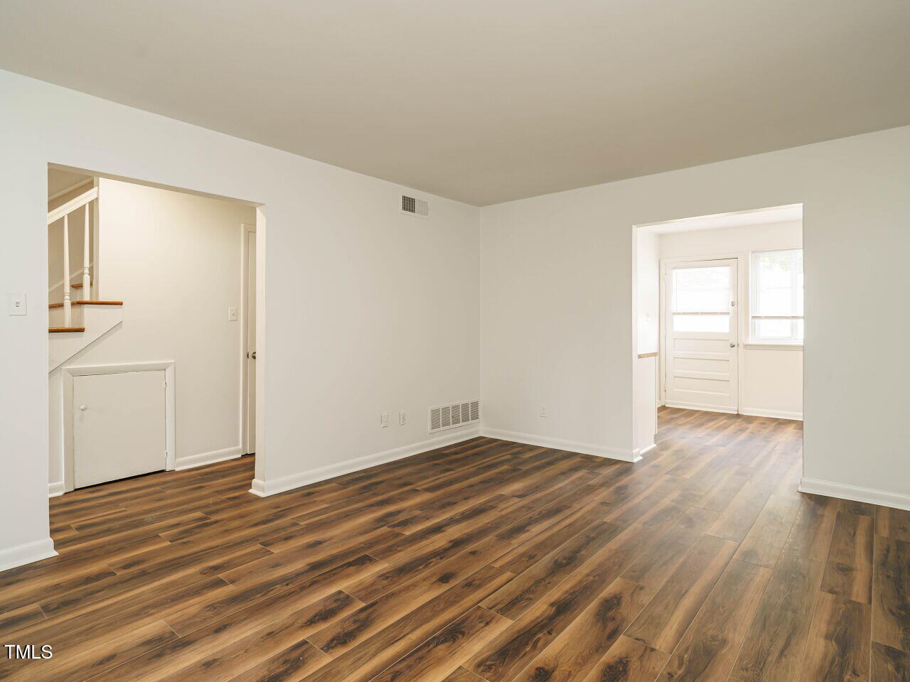 2316 Champion Court Raleigh, NC 27606 - Photo 6 of 27 wooden floor in an empty room