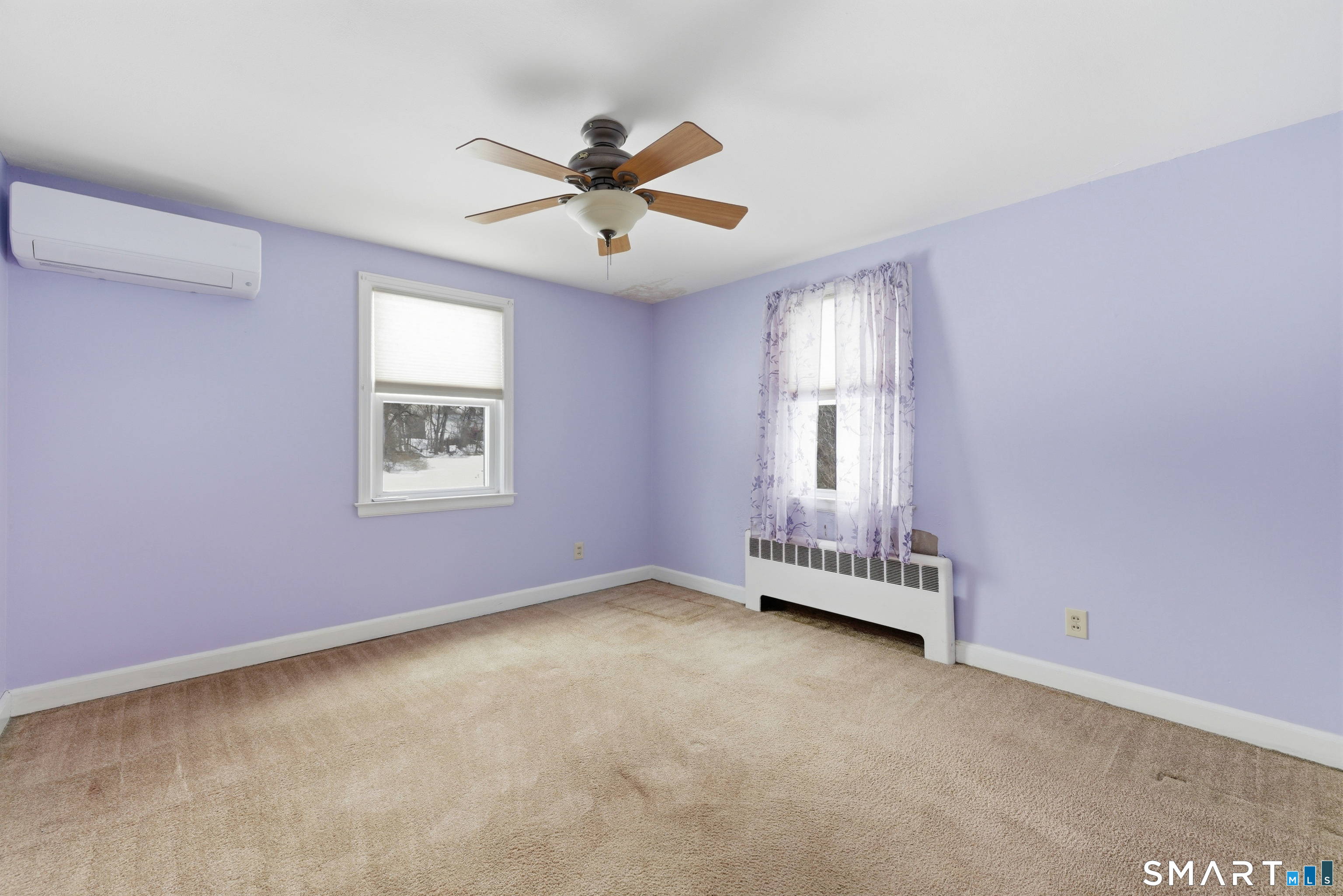 49 Tyler Street Bloomfield, CT 06002 - Photo 12 of 38 a view of an empty room with a window