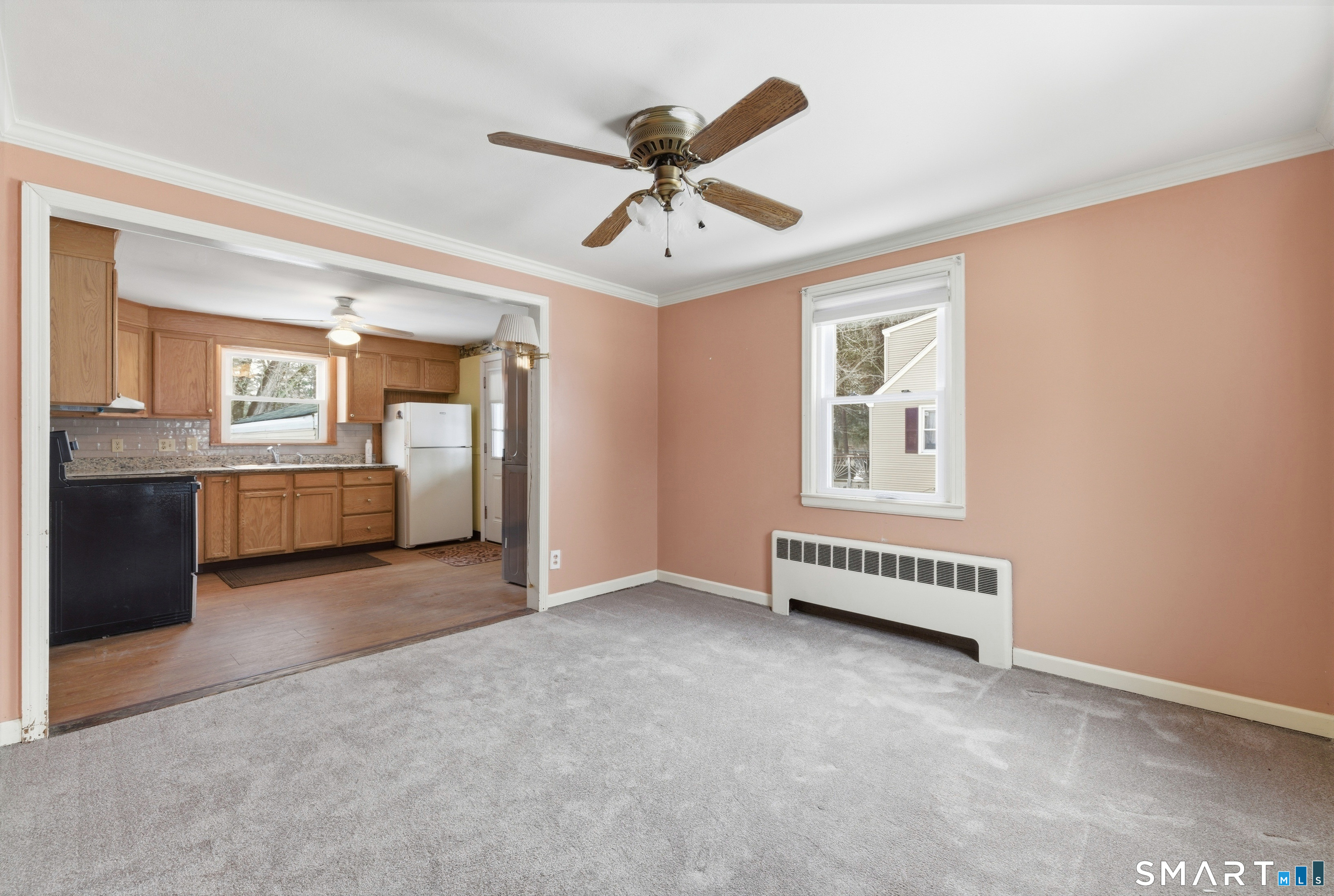 49 Tyler Street Bloomfield, CT 06002 - Photo 17 of 38 wooden floor in an empty room with a window