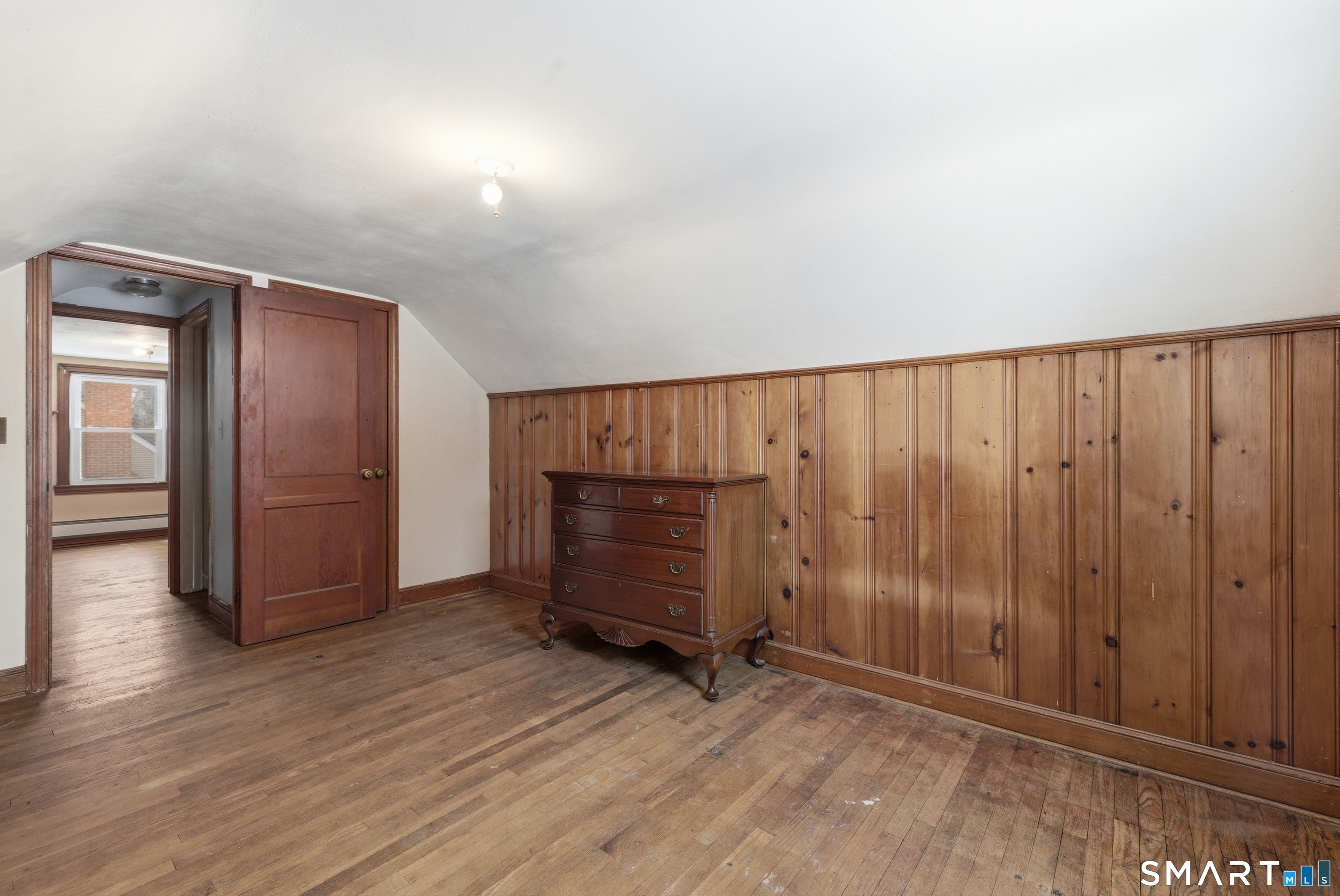 49 Tyler Street Bloomfield, CT 06002 - Photo 19 of 38 an empty room with wooden floor and closet