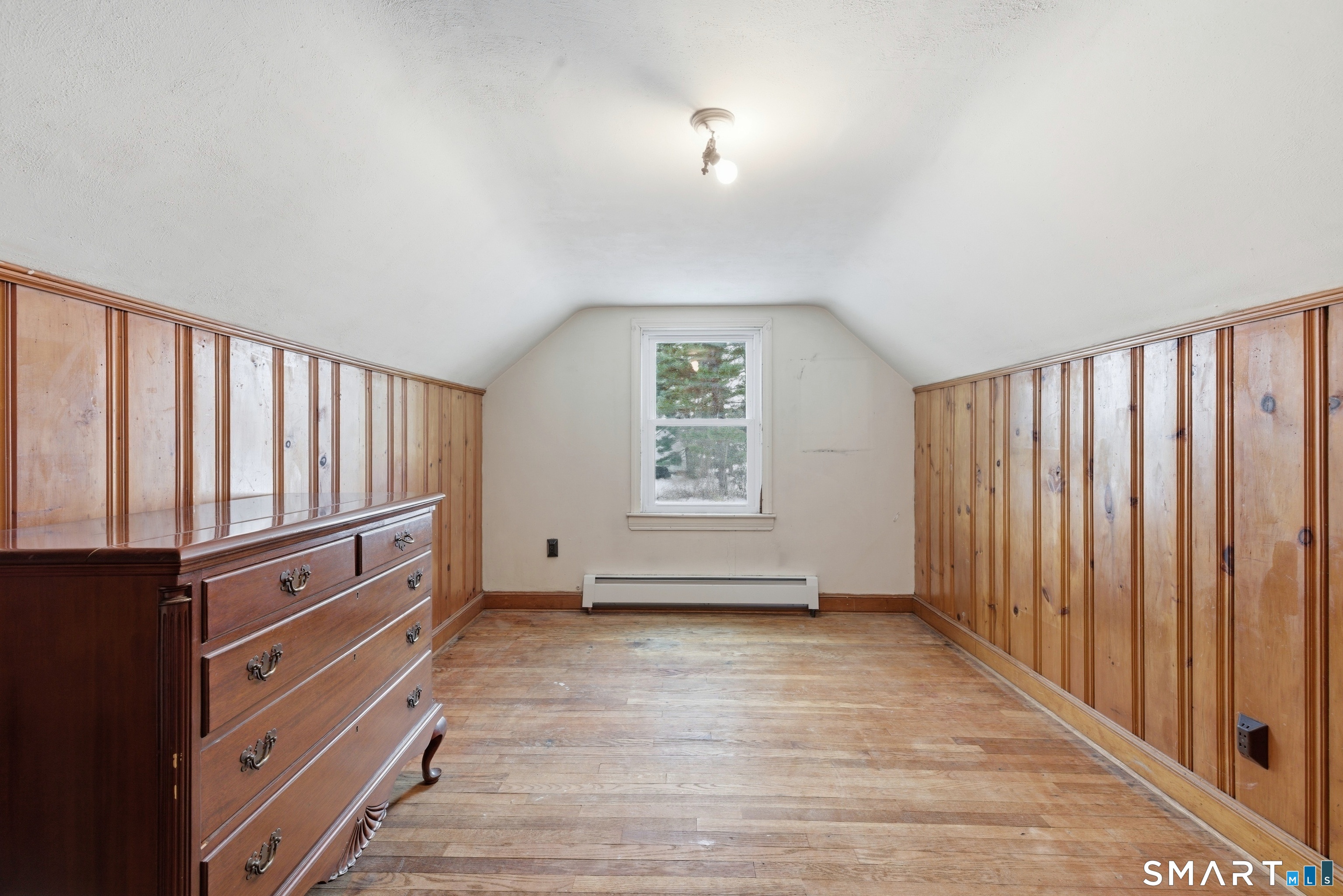 49 Tyler Street Bloomfield, CT 06002 - Photo 24 of 38 wooden floor in an empty room with a window