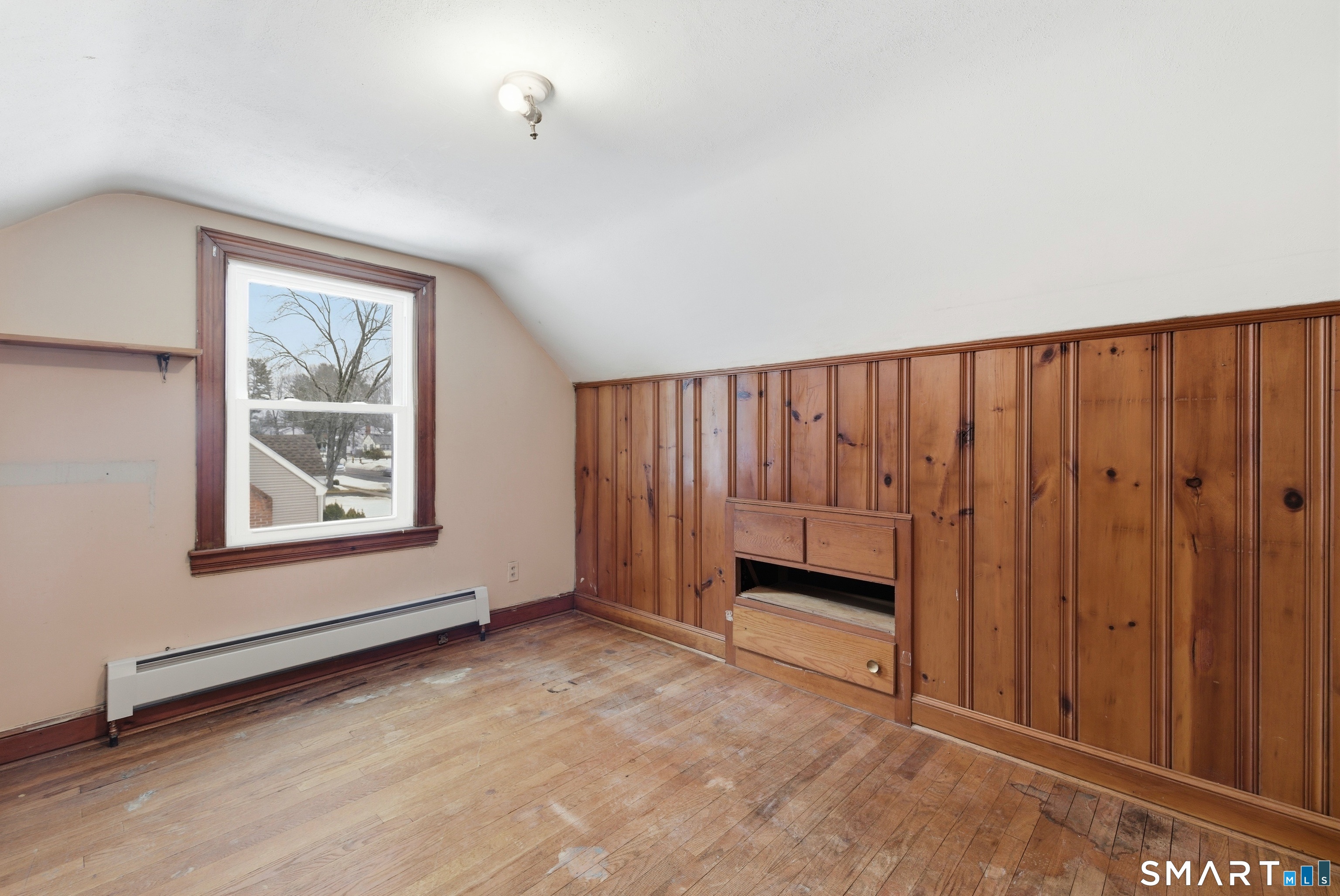 49 Tyler Street Bloomfield, CT 06002 - Photo 26 of 38 an empty room with a window and a ceiling fan