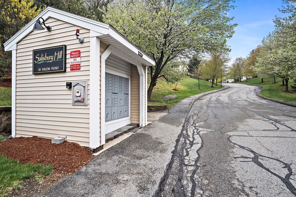81 Salem Road, Unit 21 Billerica, MA 01821 - Photo 21 of 21 a view of a house with a yard