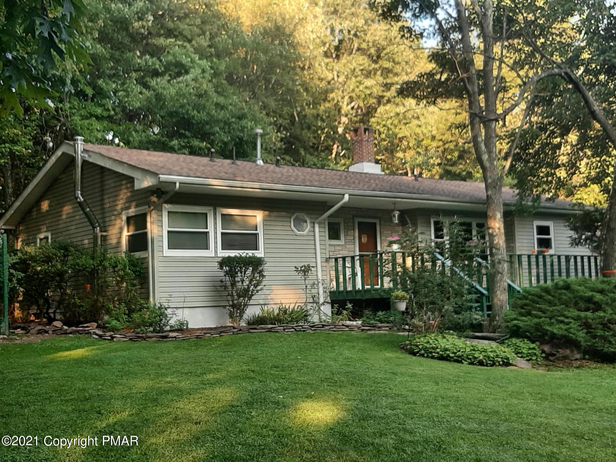235 Dyson Road Swiftwater, PA 18370 - Photo 1 of 36 a view of a house with backyard