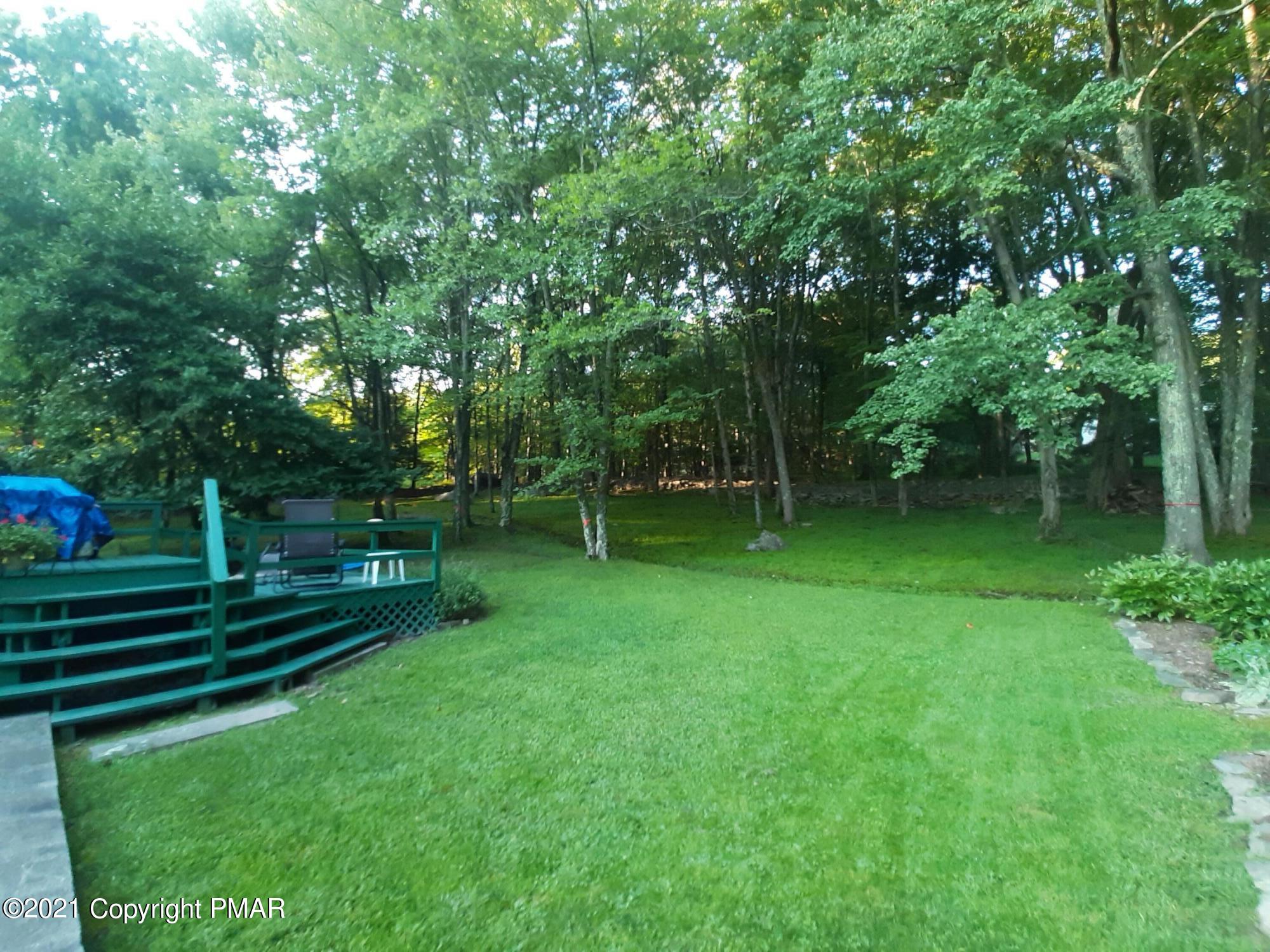 235 Dyson Road Swiftwater, PA 18370 - Photo 3 of 36 a view of a backyard with a garden