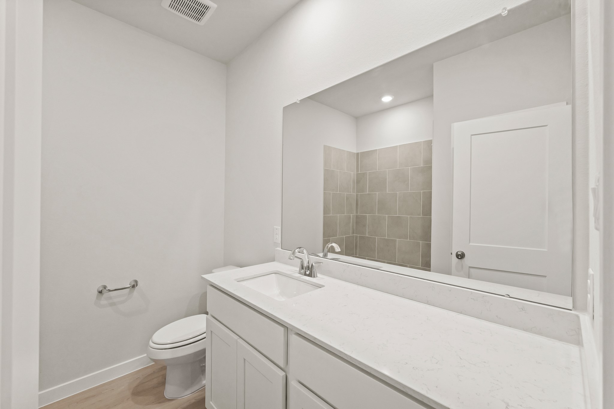 9782 Caney Bend Road Conroe, TX 77303 - Photo 17 of 32 a bathroom with a sink a toilet and shower