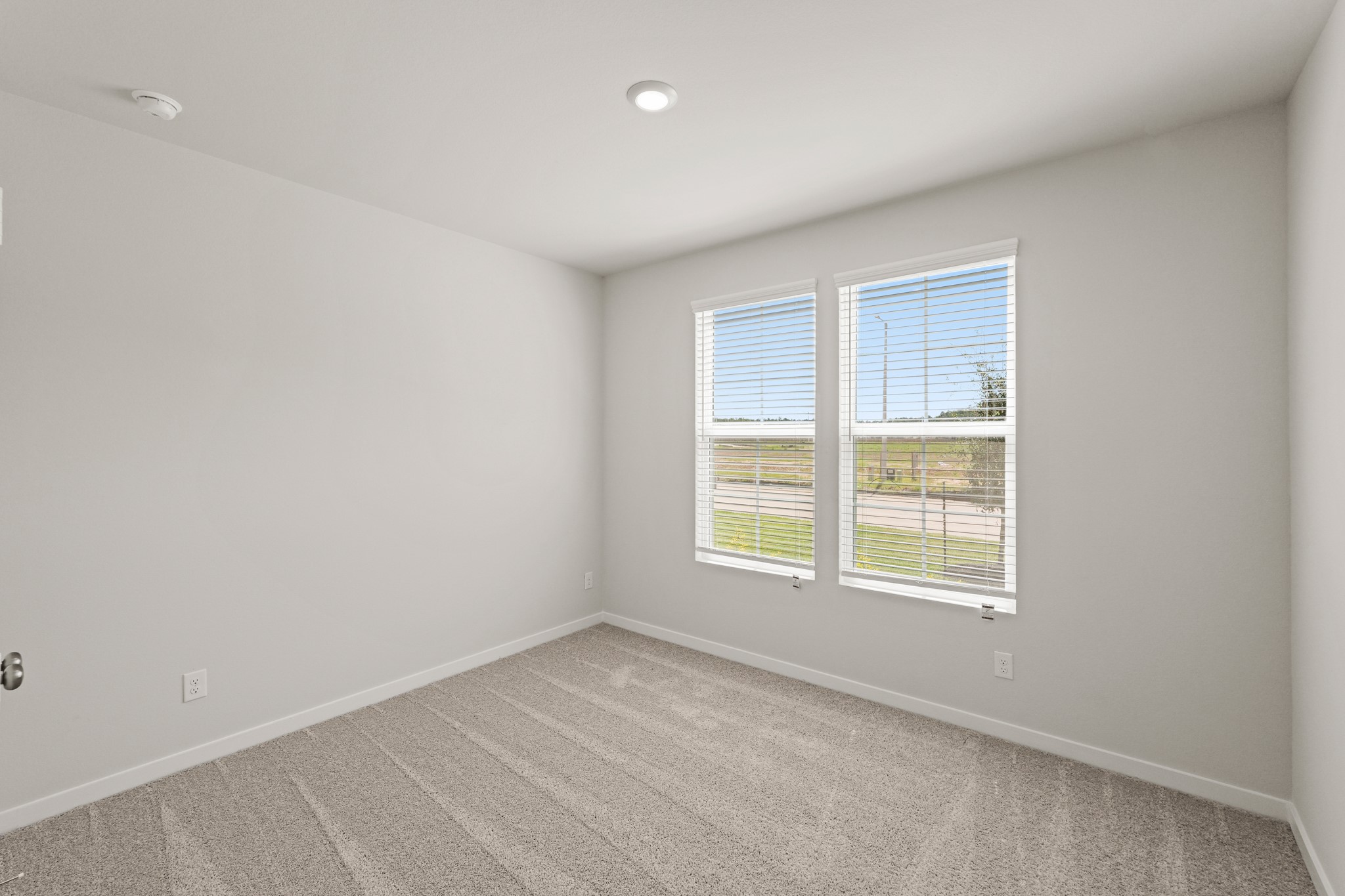 9782 Caney Bend Road Conroe, TX 77303 - Photo 18 of 32 an empty room with a window