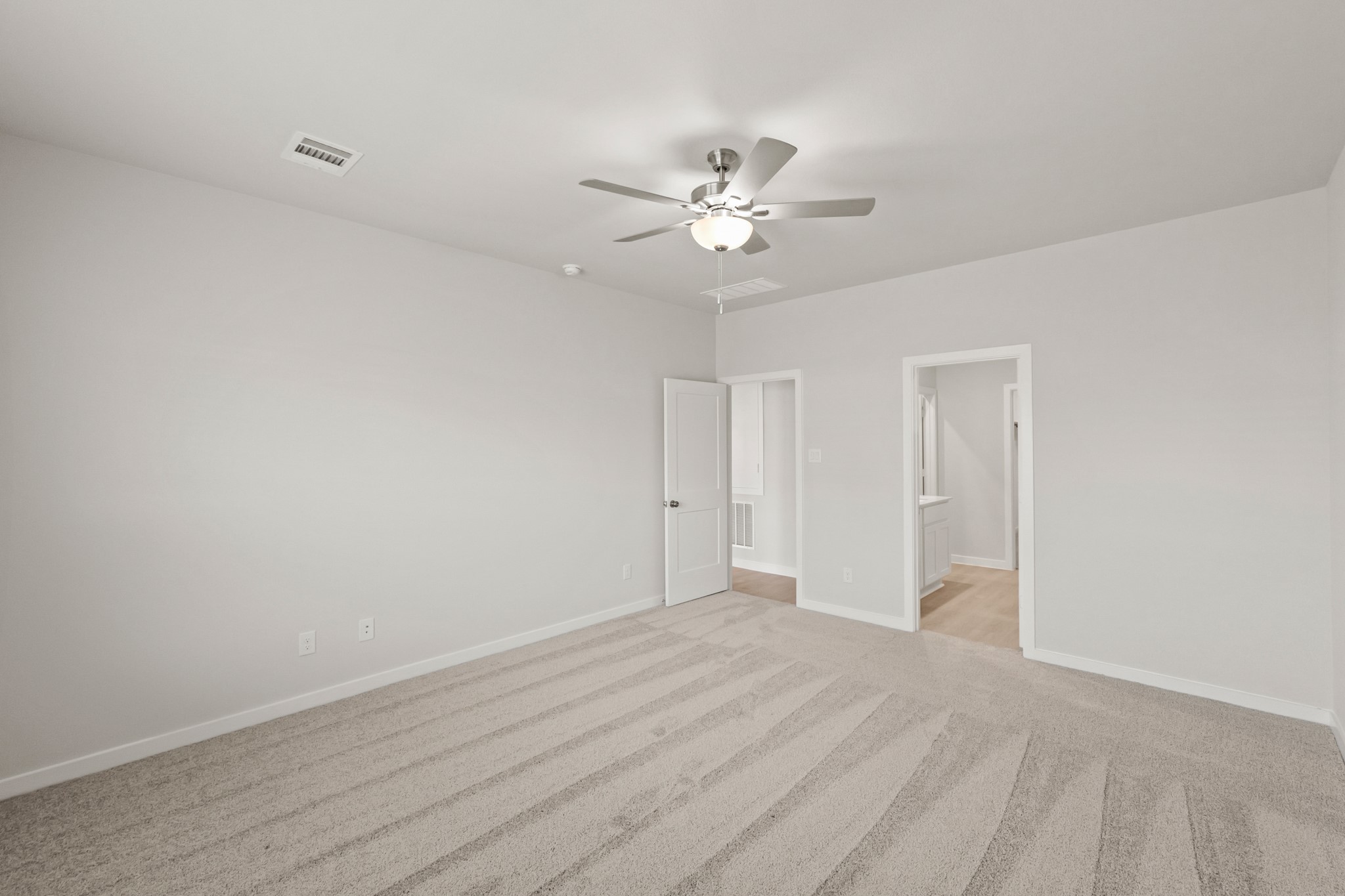 9782 Caney Bend Road Conroe, TX 77303 - Photo 22 of 32 a view of empty room with wooden floor