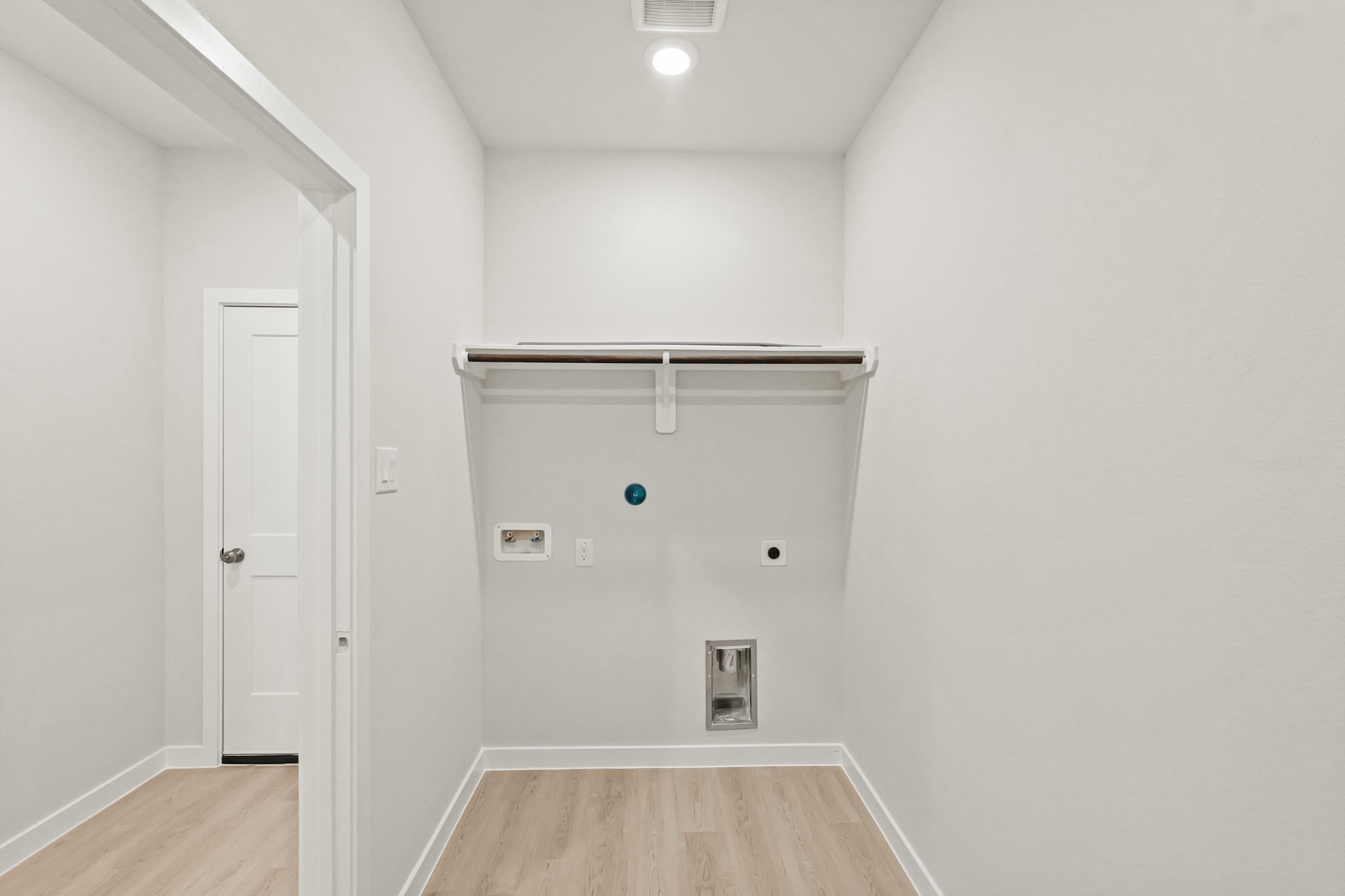 9782 Caney Bend Road Conroe, TX 77303 - Photo 27 of 32 a view of a room with wooden floor