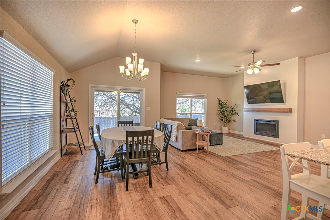 1107 Coriander Road Temple, TX 76501 - Photo 8 of 40 a view of a dining room with furniture window and wooden floor