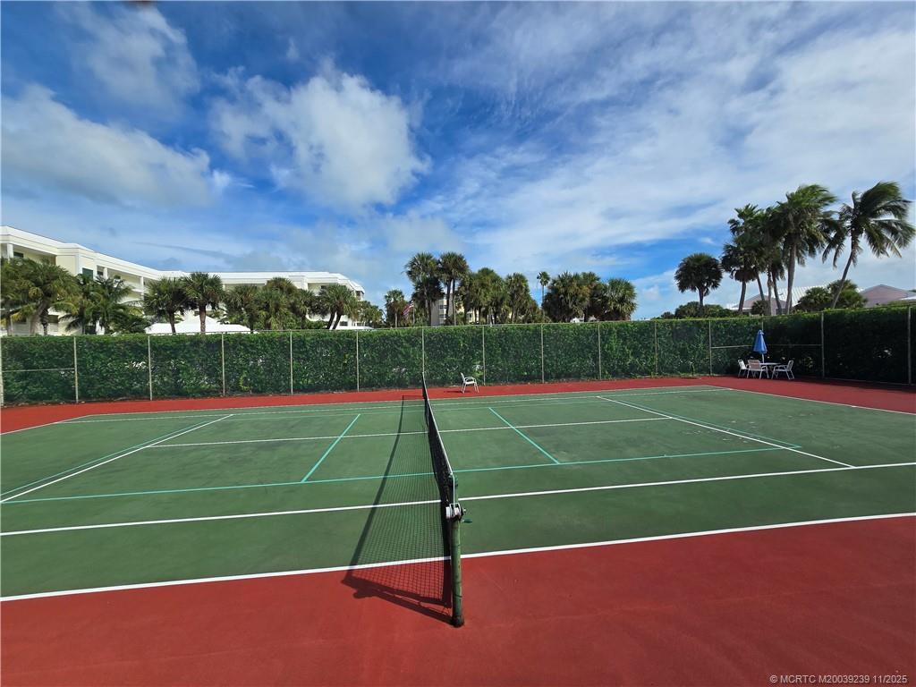 484 Northeast Plantation Road, Unit 4103 Stuart, FL 34996 - Photo 16 of 19 a view of a tennis court