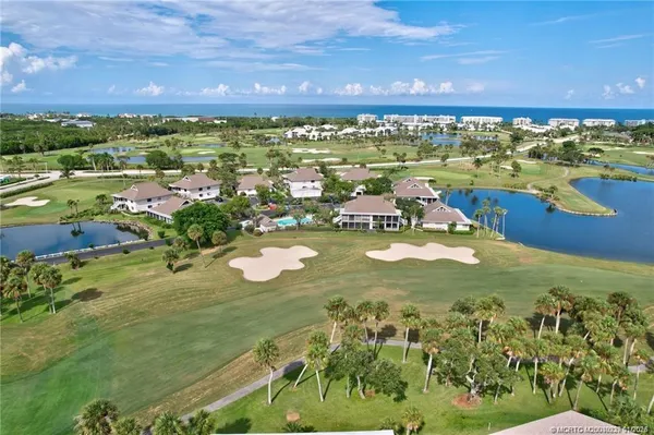 a view of a swimming pool and an outdoor space