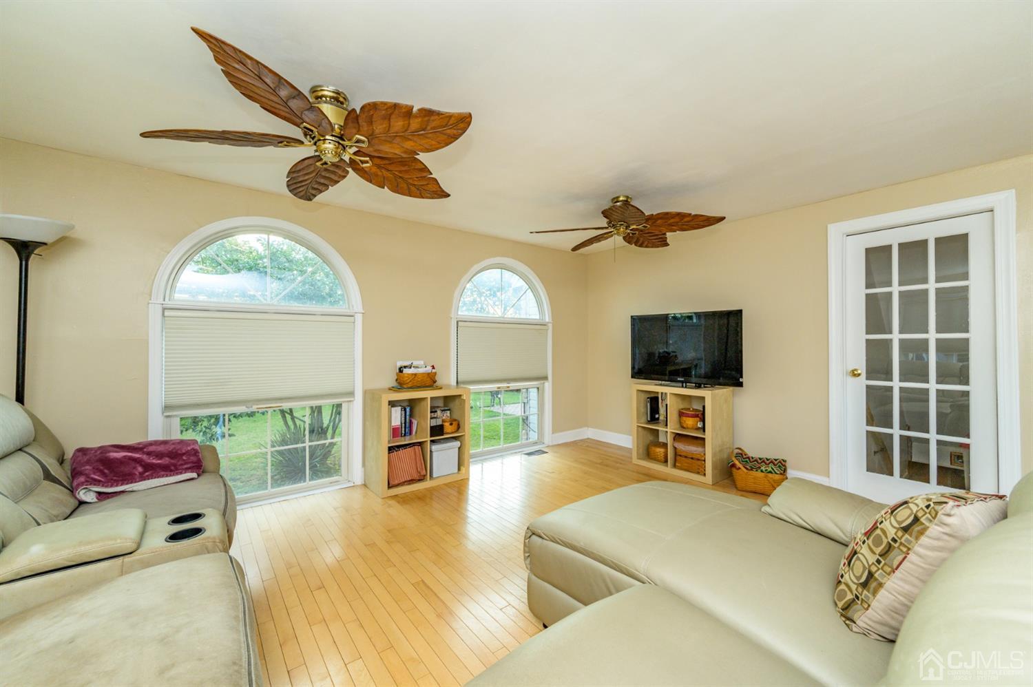 136 Tunison Road New Brunswick, NJ 08901 - Photo 14 of 33 a bedroom with a bed and a flat screen tv