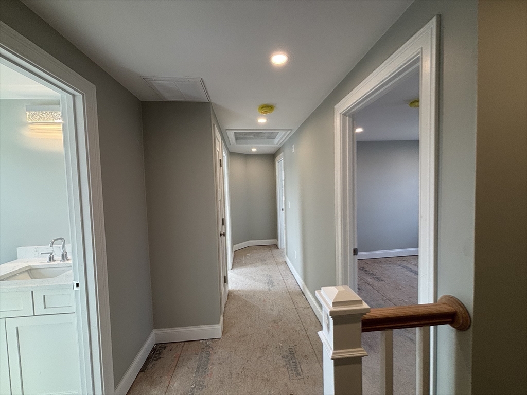 46 Holt Road, Unit A Bourne, MA 02532 - Photo 13 of 28 a view of a hallway with bathroom
