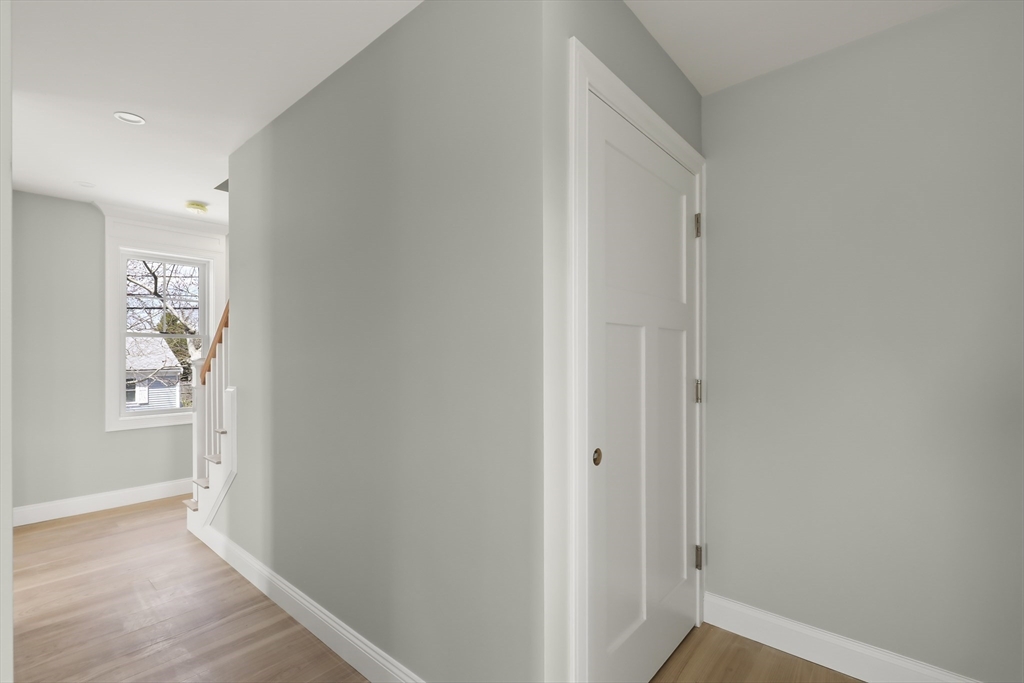 46 Holt Road, Unit A Bourne, MA 02532 - Photo 22 of 28 a view of hallway with wooden floor