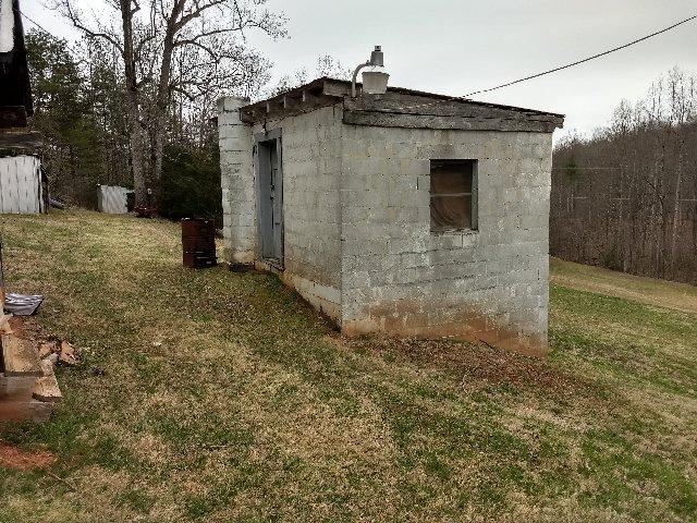 691 Henry Road Ferrum, VA 24088 - Photo 14 of 14 a view of a house with a yard