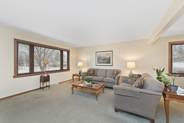 10700 Austin Avenue Chicago Ridge, IL 60415 - Photo 2 of 19 a living room with furniture and a window