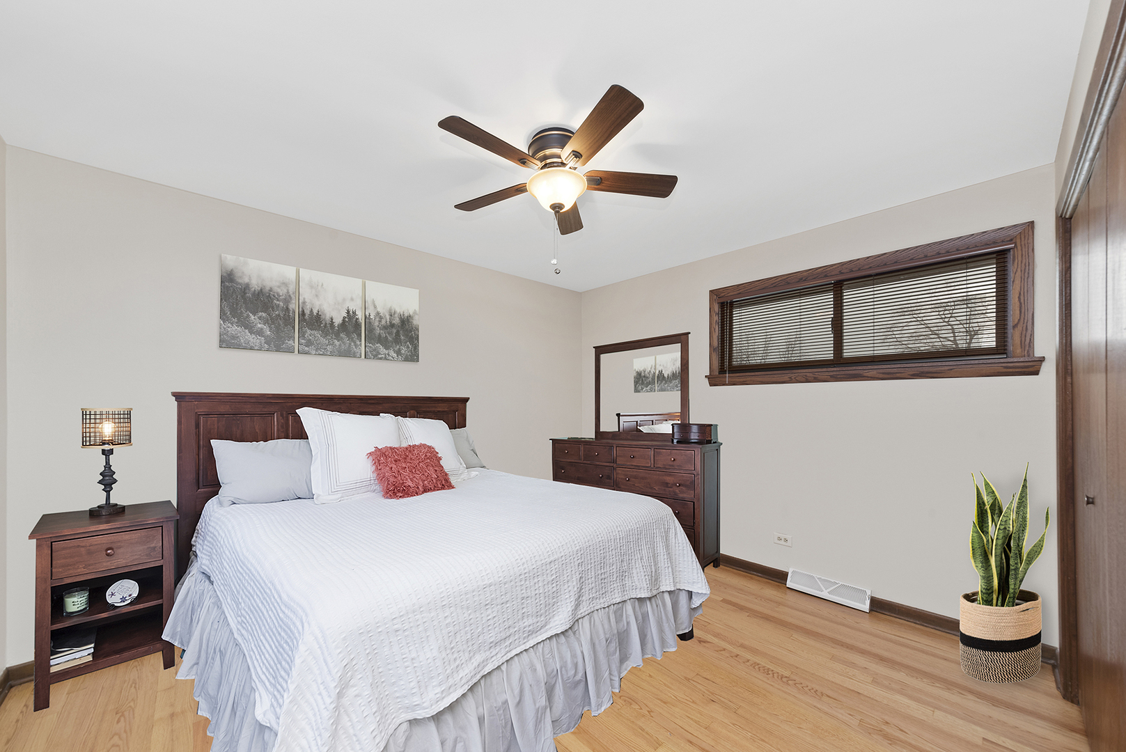 10700 Austin Avenue Chicago Ridge, IL 60415 - Photo 8 of 19 a bedroom with a bed and wooden floor