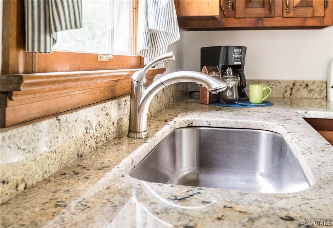 14008 Walnut Creek Road Midlothian, VA 23112 - Photo 11 of 34 a view of a kitchen sink with a stove