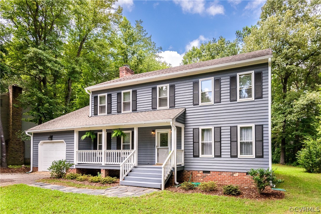 14008 Walnut Creek Road Midlothian, VA 23112 - Photo 2 of 34 a front view of a house with a yard