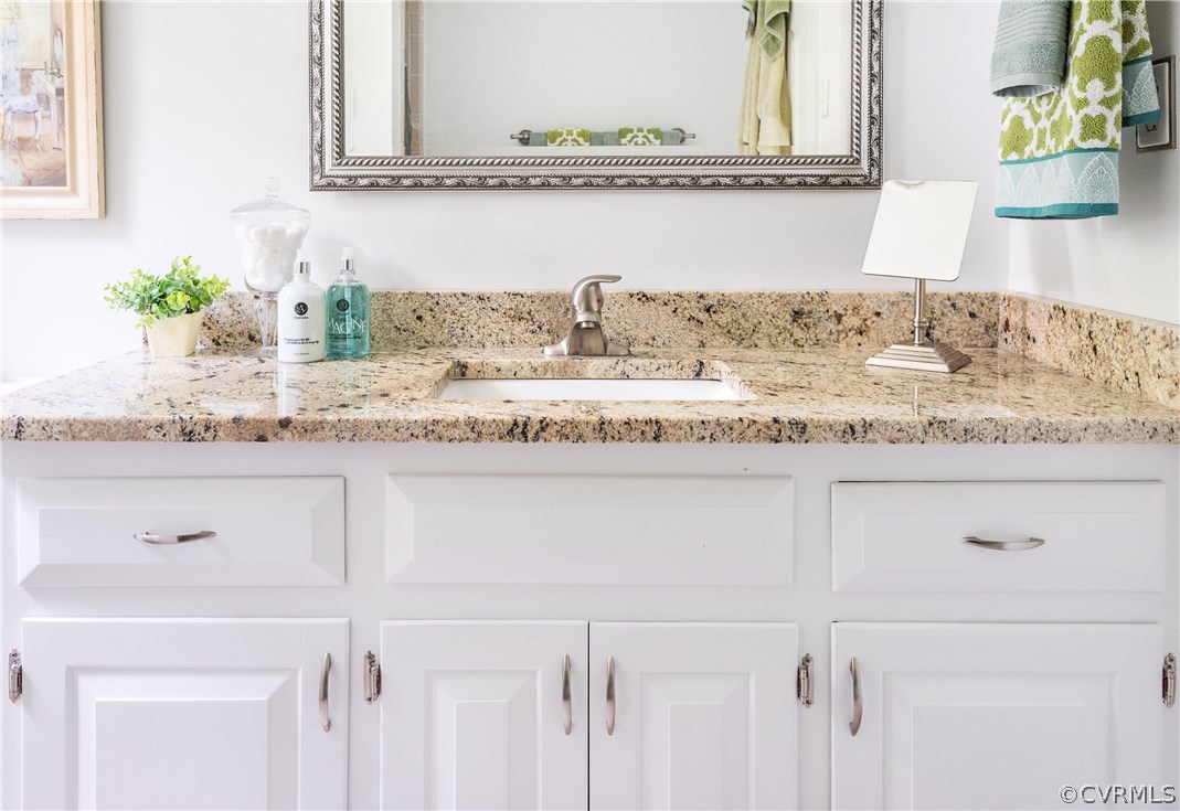 14008 Walnut Creek Road Midlothian, VA 23112 - Photo 25 of 34 a bathroom with a granite countertop sink and a white cabinets