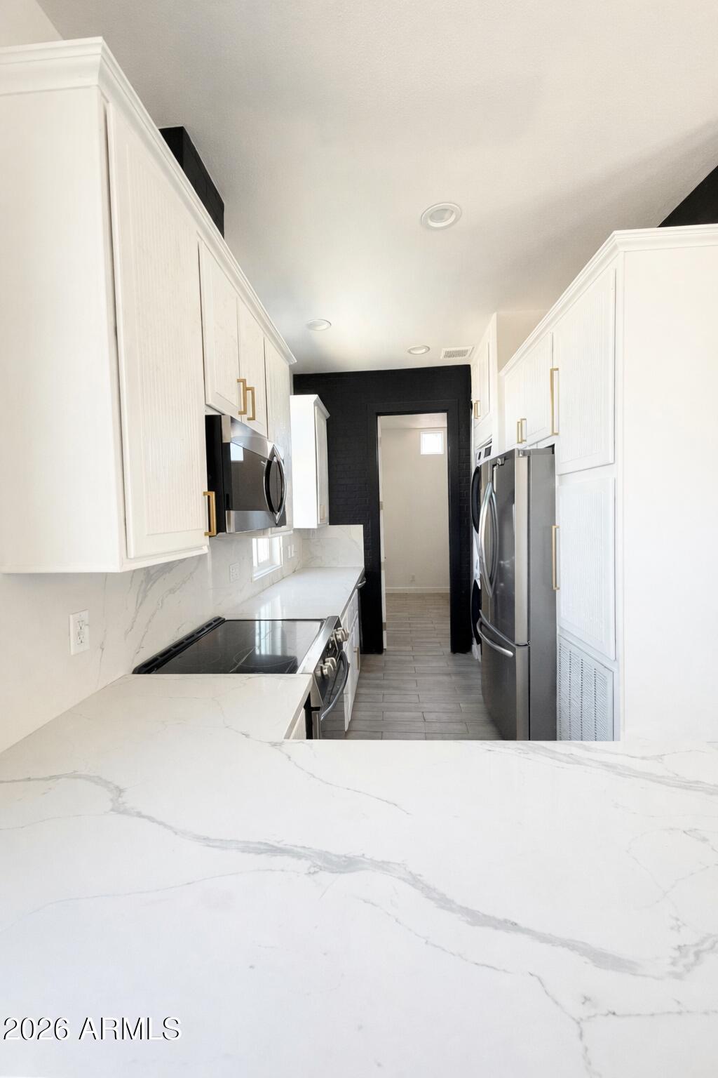 201 South Greenfield Road, Unit 215 Mesa, AZ 85206 - Photo 3 of 12 C3435328-925E-463E-9FF3-941B4D7A87BA