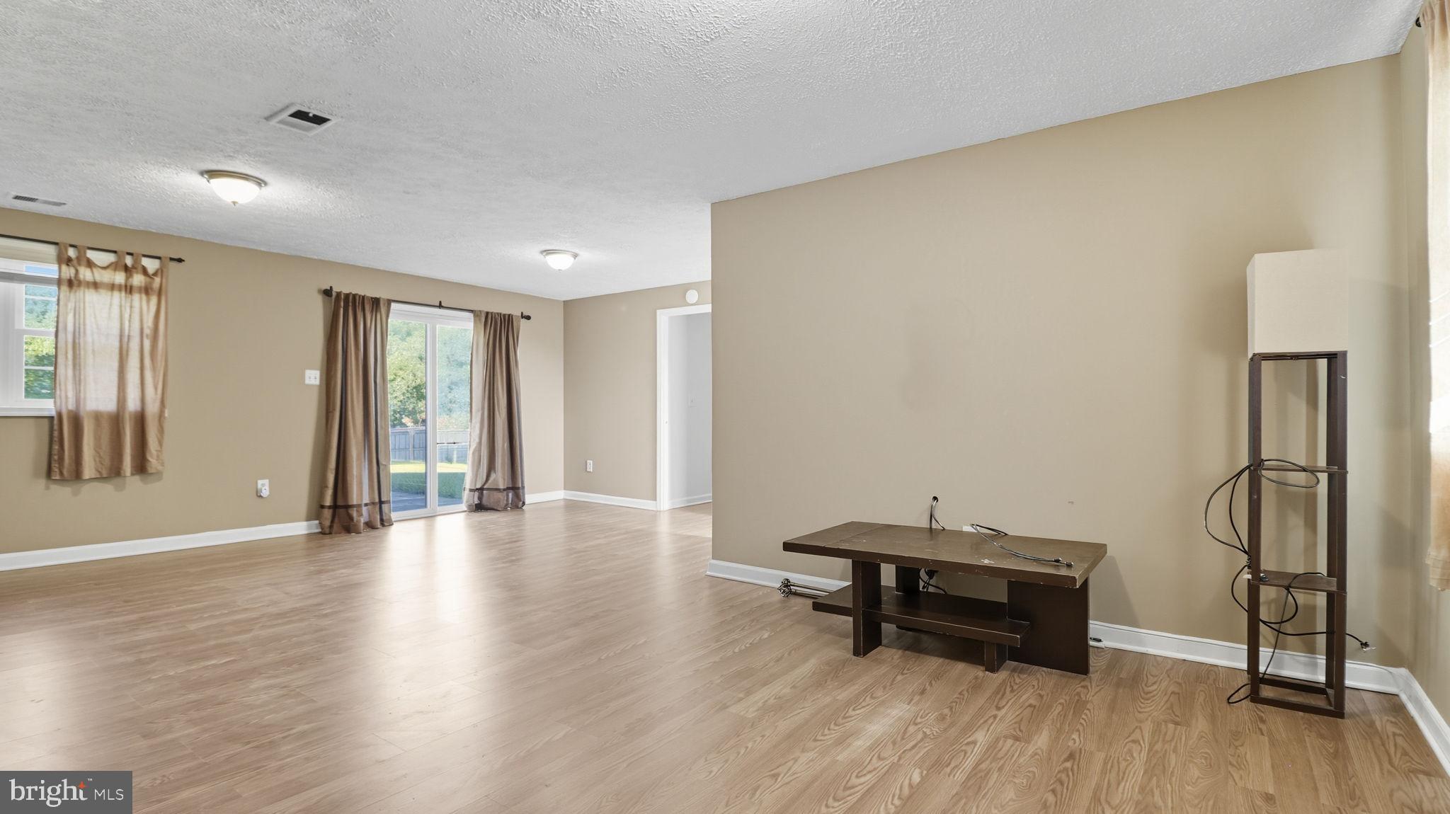 8136 Comet Drive Fort Washington, MD 20744 - Photo 41 of 49 a room with wooden floor and pool table