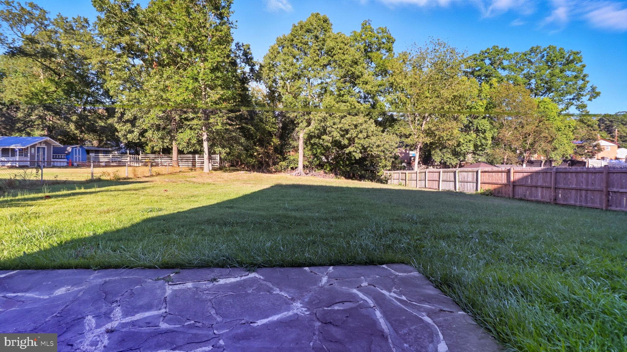 8136 Comet Drive Fort Washington, MD 20744 - Photo 48 of 49 a view of a trees with a yard