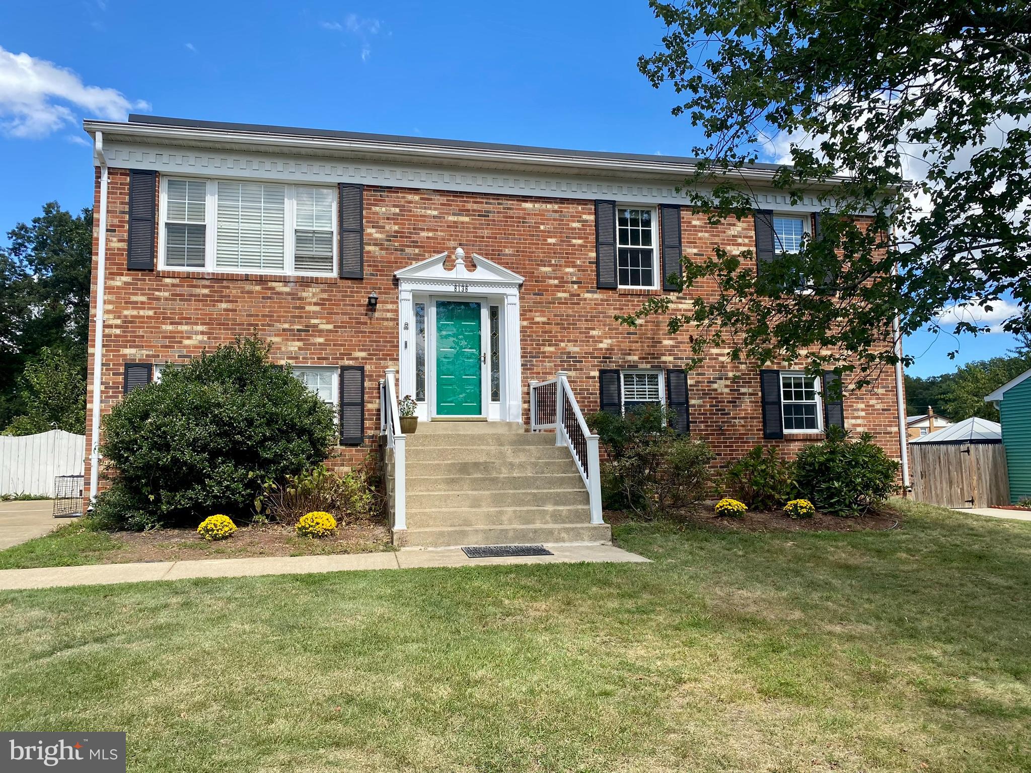 8136 Comet Drive Fort Washington, MD 20744 - Photo 49 of 49 a front view of a house with a yard