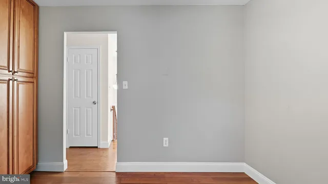 a view of small space with wooden floor