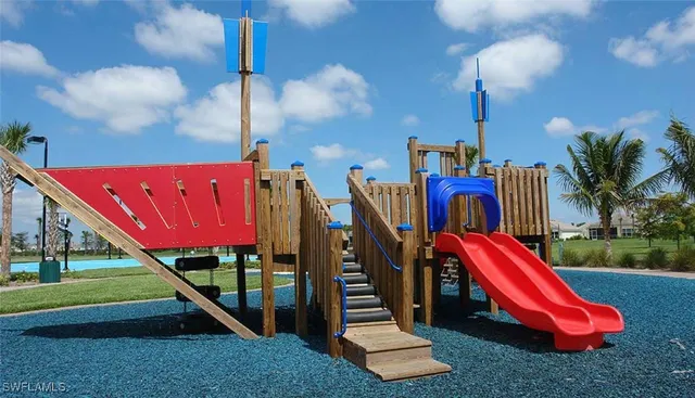 a view of a park with a slide