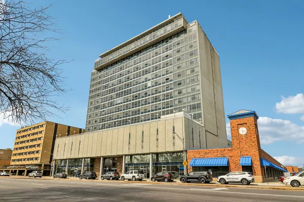 a view of a building with a street