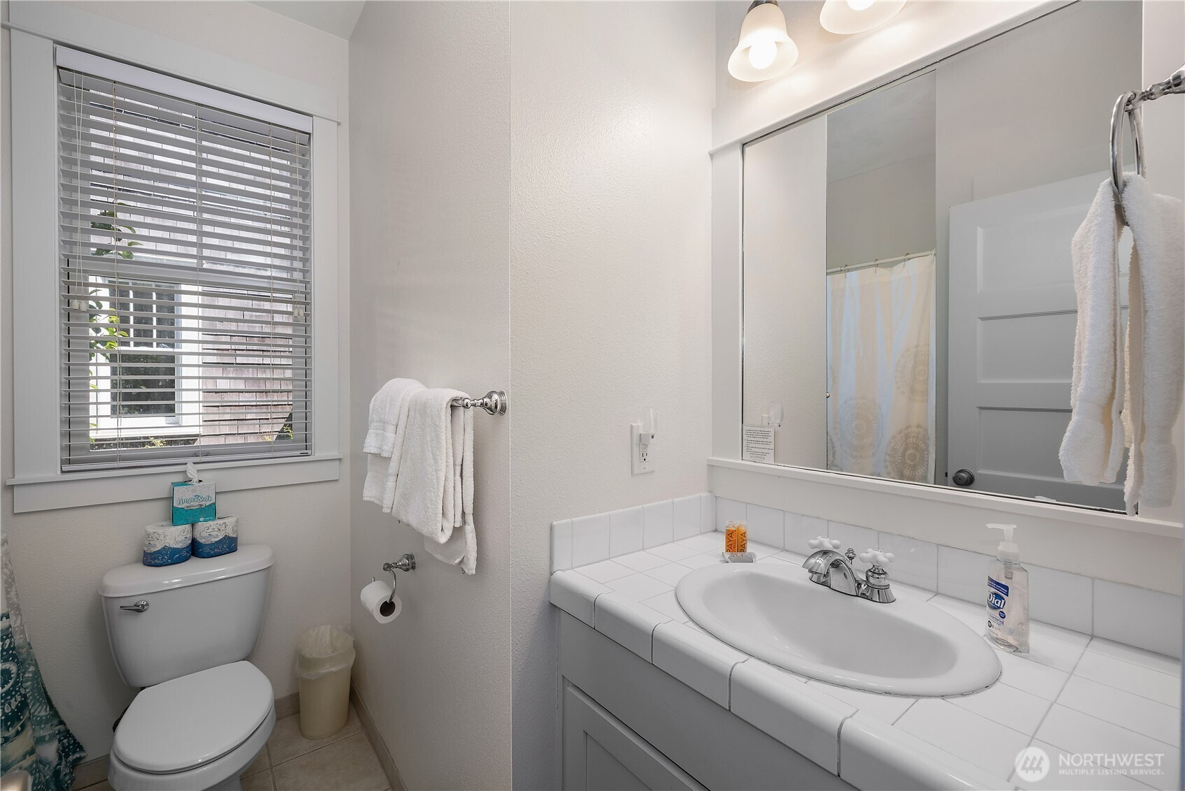 34 Seastar Lane Pacific Beach, WA 98571 - Photo 14 of 28 a bathroom with a sink toilet and shower