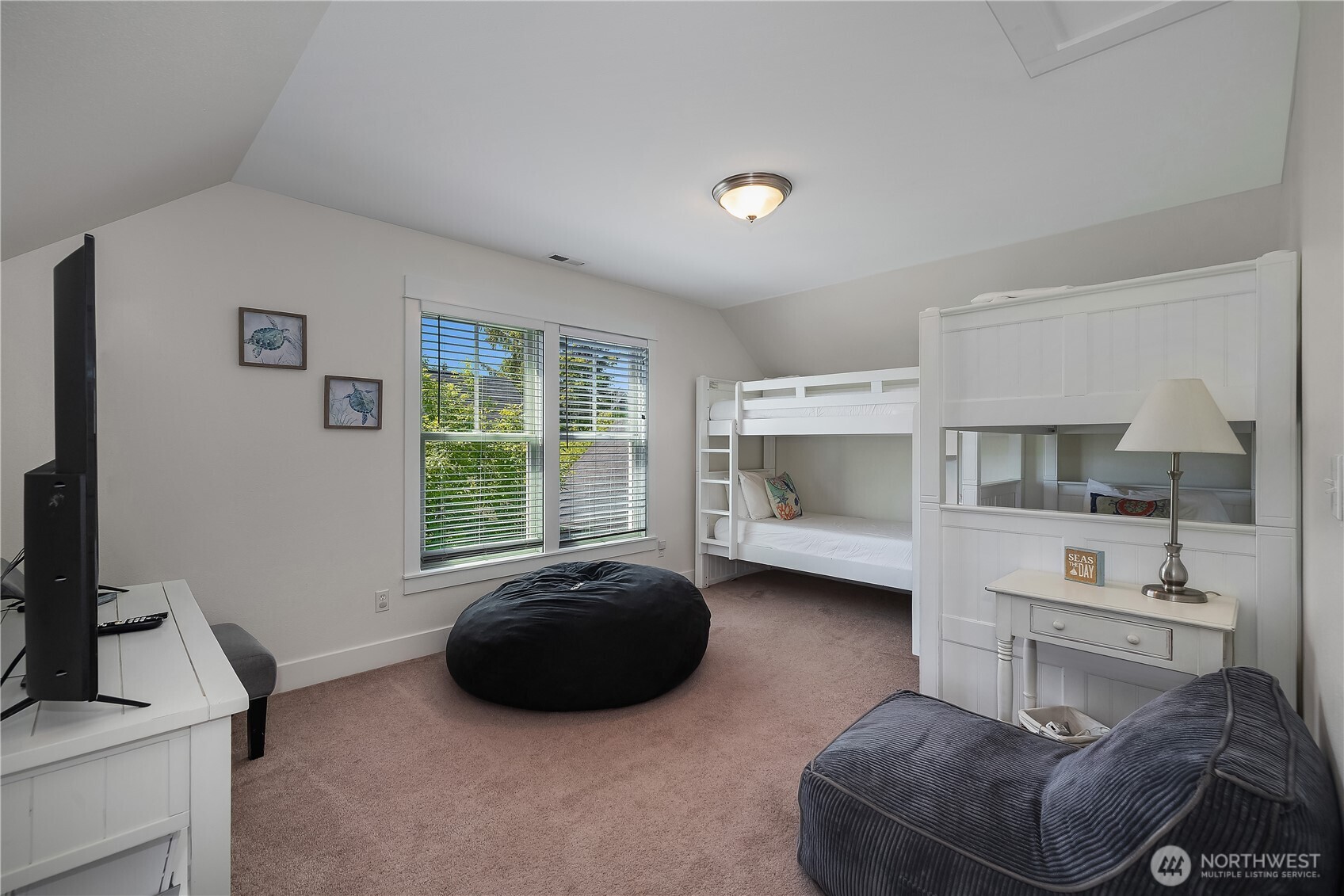 34 Seastar Lane Pacific Beach, WA 98571 - Photo 19 of 28 a bedroom with furniture and a window