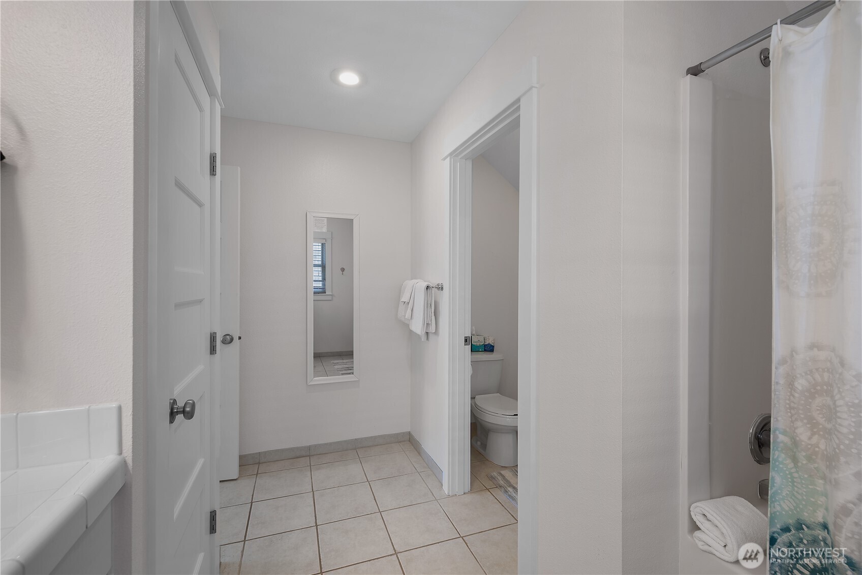 34 Seastar Lane Pacific Beach, WA 98571 - Photo 20 of 28 a view of a bathroom with a shower and a toilet
