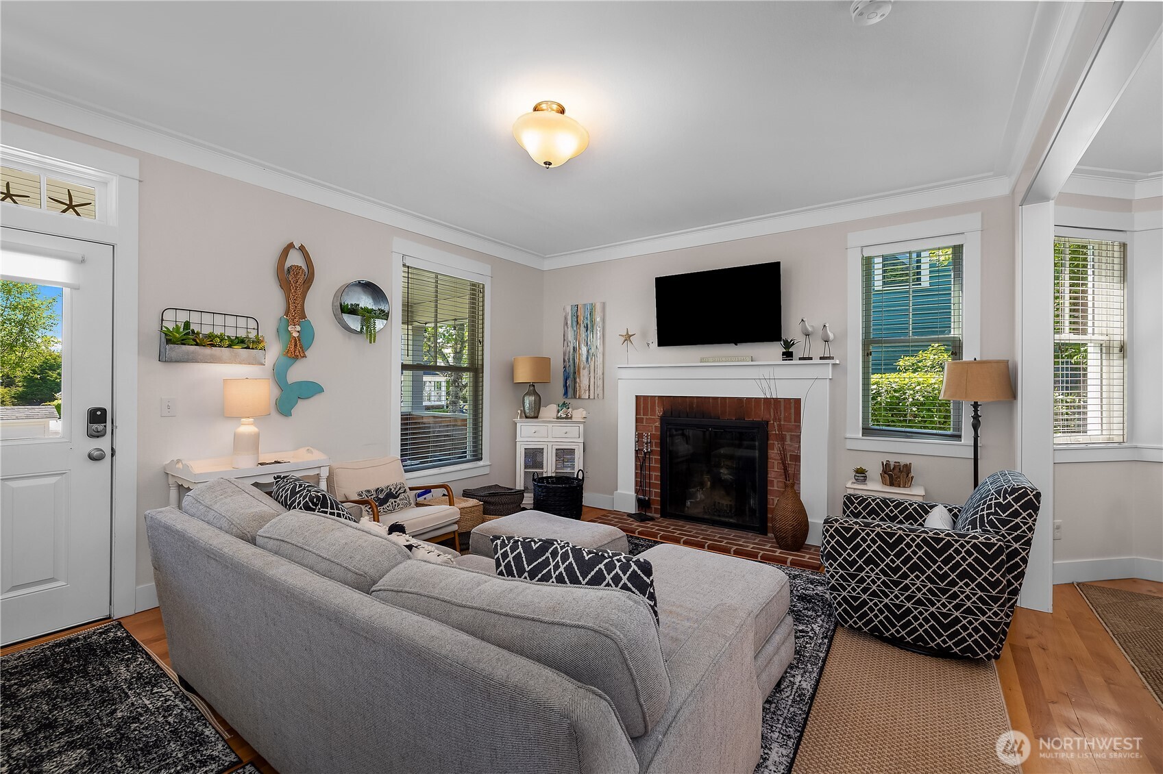34 Seastar Lane Pacific Beach, WA 98571 - Photo 4 of 28 a living room with furniture and a fireplace