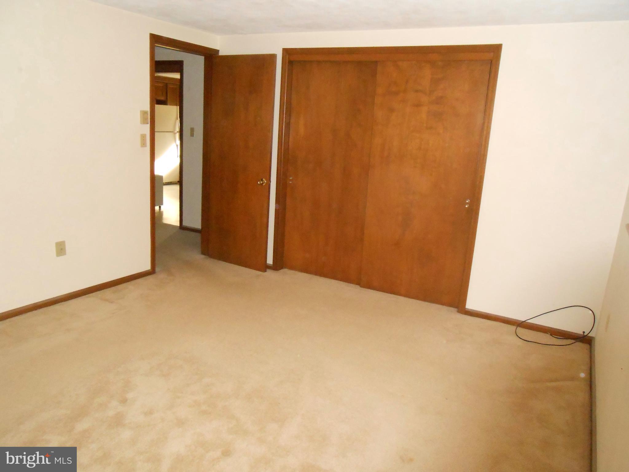 36 Troy Drive Lititz, PA 17543 - Photo 40 of 44 Apartment bedroom 1 closet and entrance