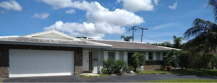 1499 Northwest 7th Street Boca Raton, FL 33486 - Photo 1 of 3 Front