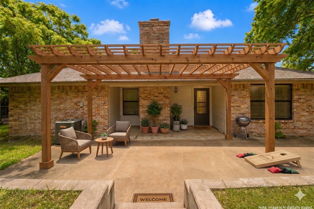 1001 Rosebud Drive Azle, TX 76020 - Photo 29 of 36 Expansive concrete patio featuring a wood pergola, brick exterior, and a white paneled entry door