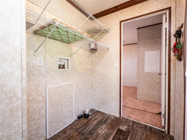 a front view of house with yard and trees