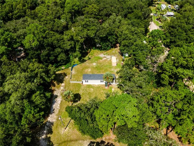 a picture of a book and a white wall